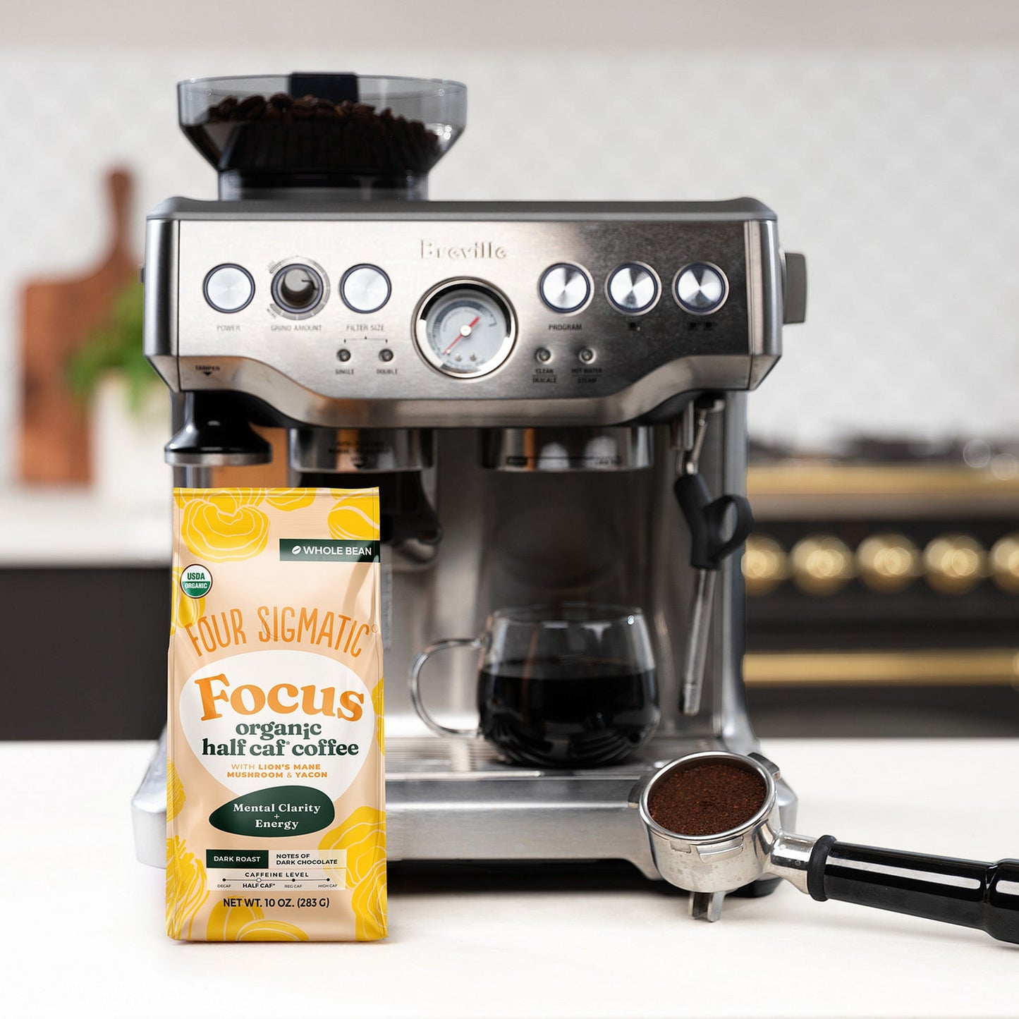 focus-half-caf-whole-bean-coffee-s9 Focus_Org_Dark_Roast_High_Caf_Kitchen_Pour_Woman_4_47b71a0c-c7fc-40fd-a2bc-fa7389dfb410.jpg